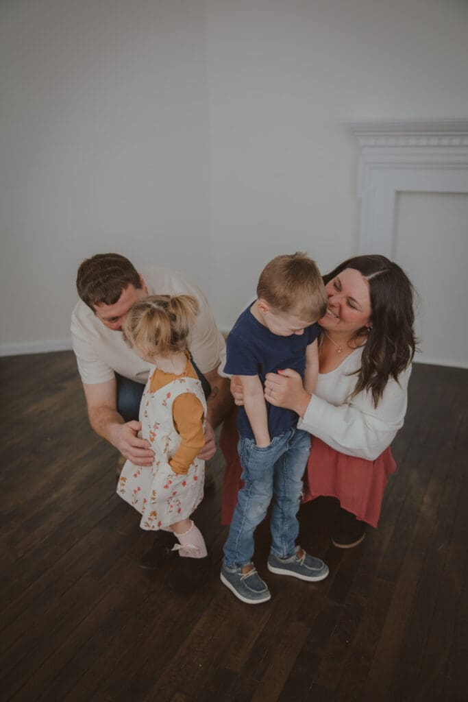 cute family playing together inside