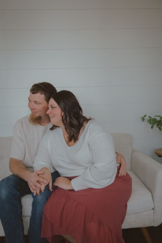 couple sitting together on couch