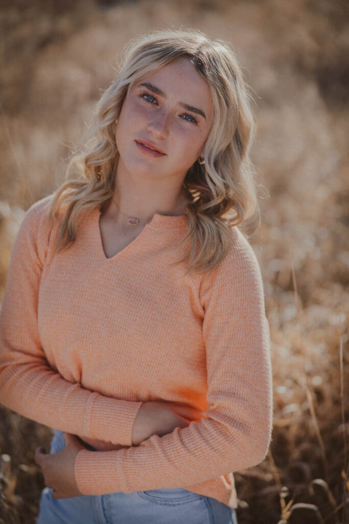 senior girl fall orange sweater photo