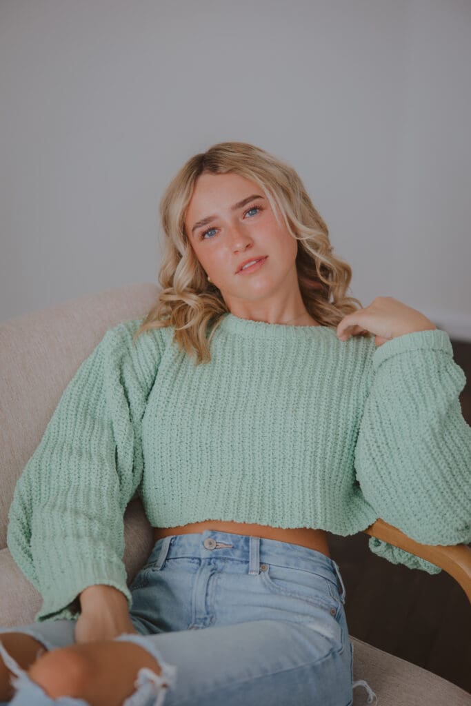 studio senior session blonde hair green sweater
