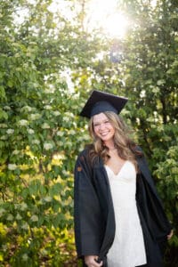 Cap and Gown Senior Girl Outdoor Photo Session Smiling Iowa Simpson College Washington Iowa High School