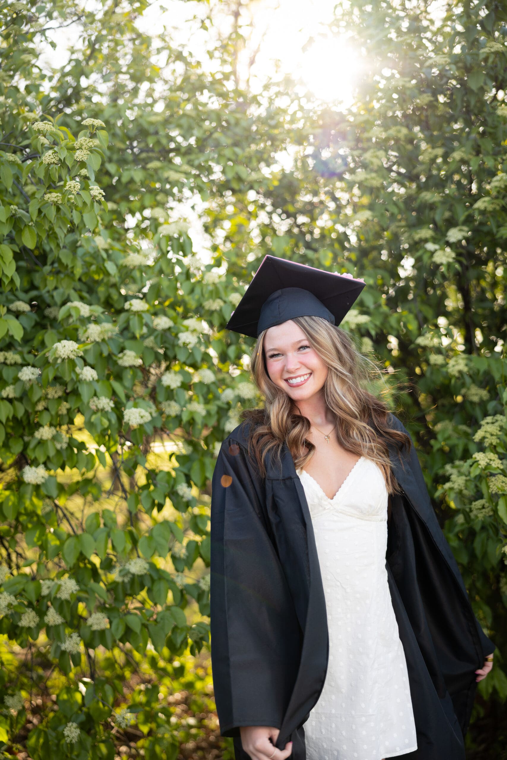 Cap and Gown Senior Girl Outdoor Photo Session Smiling Iowa Simpson College Washington Iowa High School