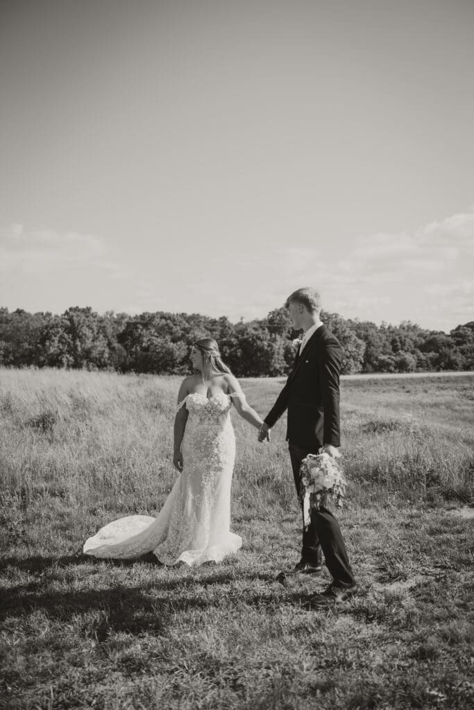 black and white bride and groom portrait outdoors