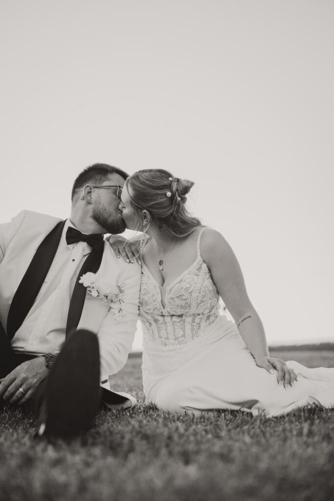 black and white bride and groom kissing